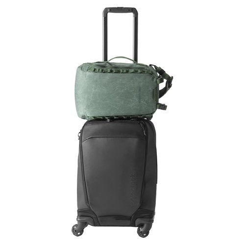 eagle creek Explore Sling Pack - Compact Crossbody Sling Bag With Cushioned Back Panel, Reinforced Side Grab Handle & Stretchy Mesh Side Pockets - Travel Accessories - Grass Green