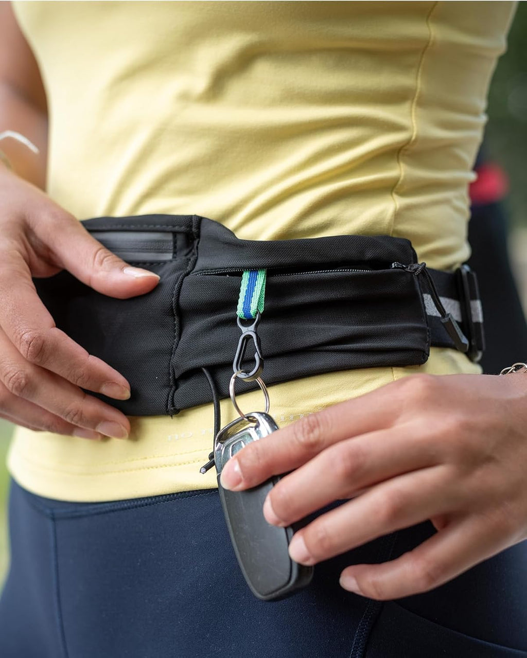 WATERFLY Running Belt - Breathable Fanny Pack with 3 Pockets for Fitness | Fits All Phones - Black