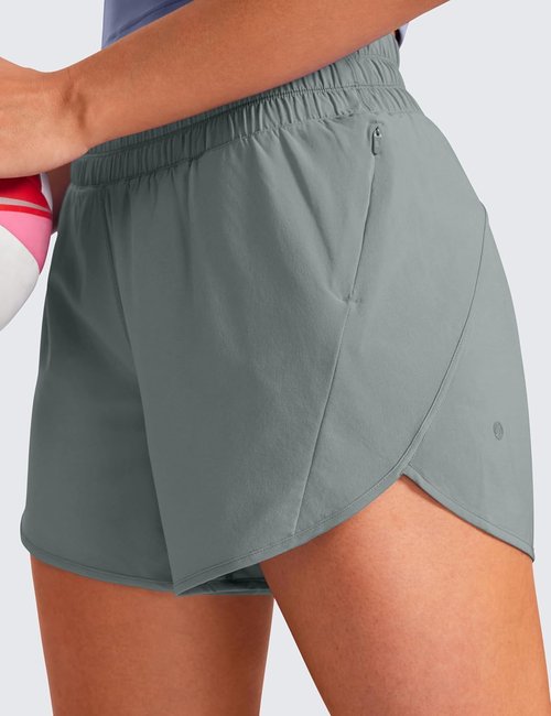 CRZ YOGA Dolphin Athletic Shorts - Women's 5" Mid-Waisted Quick-Dry Running Shorts with Zip Pocket