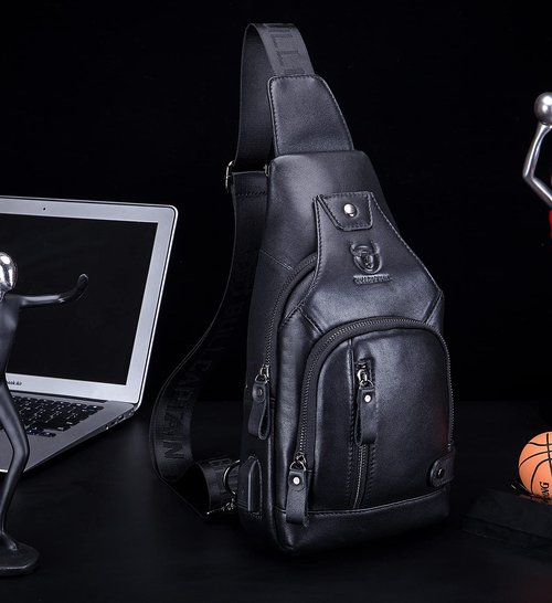 BULLCAPTAIN Men Crossbody Bag with USB Charging Port Genuine Leather Shoulder Sling Chest Bag Travel Hiking Backpack (Black)