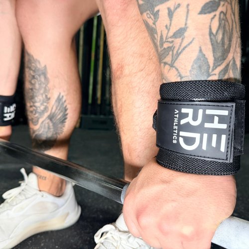 Herd Athletics Weightlifting Wrist Wraps – 12" & 18" Adjustable Support with Thumb Loop – Medium Stiffness for Powerlifting, Olympic Lifting, Functional Fitness, Bodybuilding (Black/White, 12")
