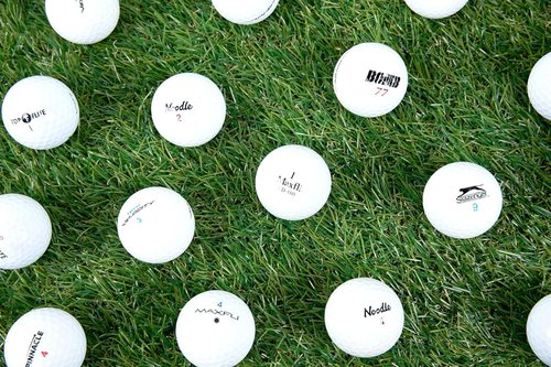 Clean Green Golf Balls | 48 Recycled Golf Balls in Good Condition - Perfect for Practice with Mesh Bag